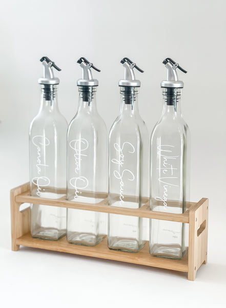 4 bottles with vinyl labels and rack